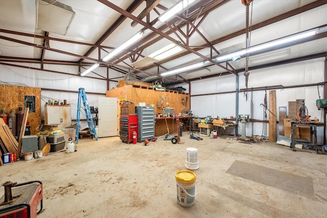 209 Circle Dr, Alvarado, TX 76009 - garage featuring a workshop area