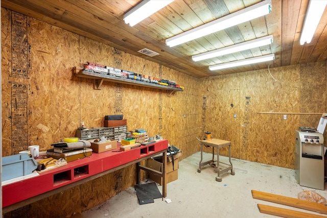209 Circle Dr, Alvarado, TX 76009 - miscellaneous room featuring a workshop area and concrete floors