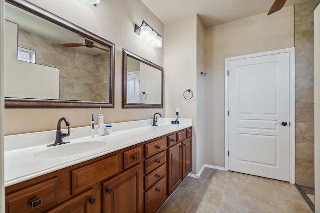 6173 Arcadia Park Ln, Frisco, TX 75036 - full bath with ceiling fan, double vanity, tile patterned floors, and baseboards