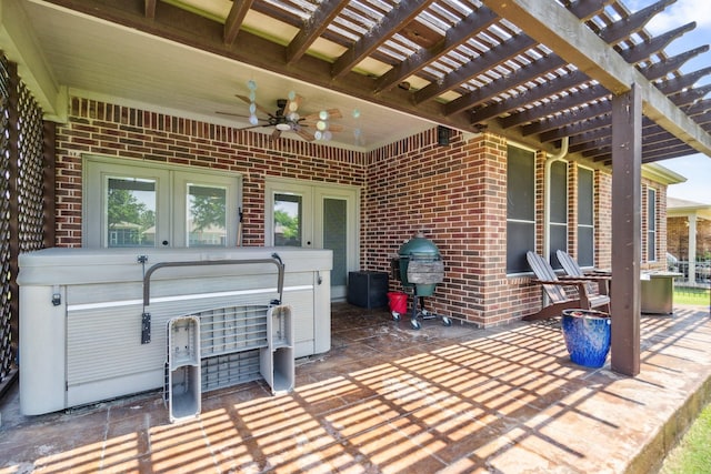 6173 Arcadia Park Ln, Frisco, TX 75036 - view of patio / terrace with a hot tub, a ceiling fan, and a pergola