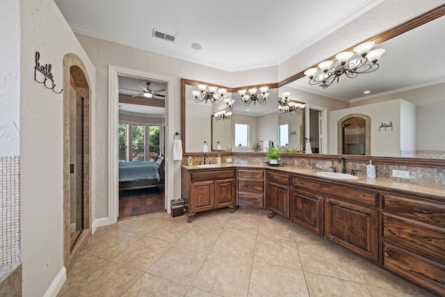 4452 Druid Hills Dr, Frisco, TX 75034 - bathroom with double vanity, a chandelier, ornamental molding, ensuite bath, and a ceiling fan