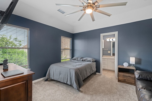 4452 Druid Hills Dr, Frisco, TX 75034 - bedroom with light colored carpet, multiple windows, and ensuite bathroom