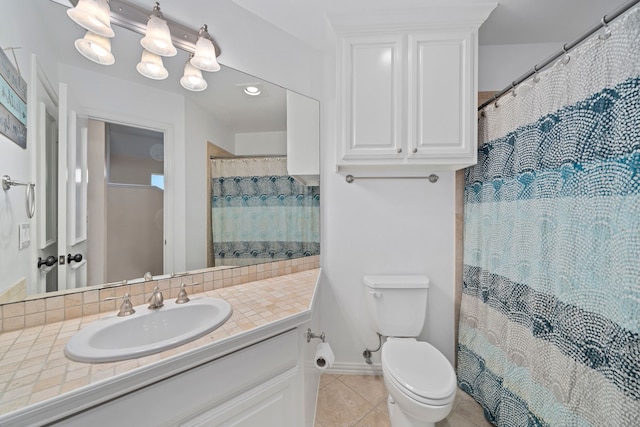 4452 Druid Hills Dr, Frisco, TX 75034 - bathroom featuring vanity, tile patterned flooring, toilet, and curtained shower
