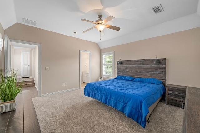4452 Druid Hills Dr, Frisco, TX 75034 - carpeted bedroom featuring lofted ceiling, baseboards, connected bathroom, ceiling fan, and wood finished floors