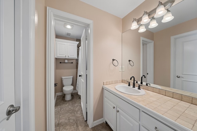 4452 Druid Hills Dr, Frisco, TX 75034 - full bathroom with vanity, toilet, and baseboards