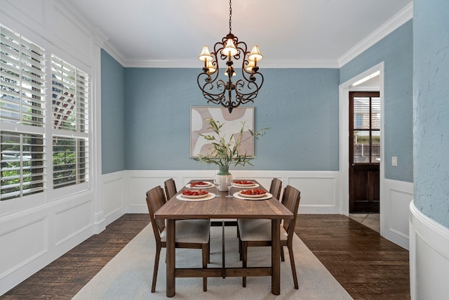 4452 Druid Hills Dr, Frisco, TX 75034 - dining space featuring wood finished floors, a chandelier, crown molding, and wainscoting