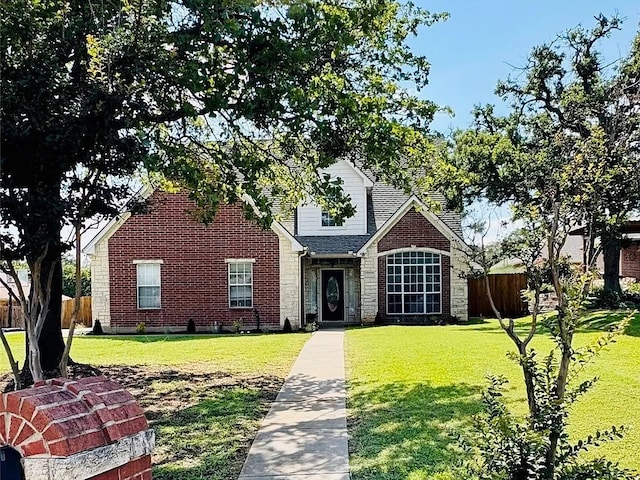 702 John Thomas Dr, Keene, TX 76059 - traditional home featuring brick siding