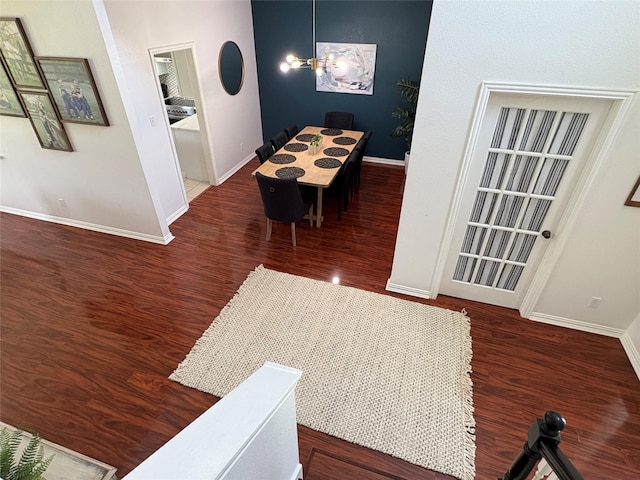 702 John Thomas Dr, Keene, TX 76059 - dining area with baseboards and wood finished floors