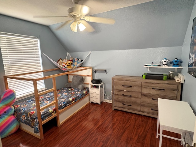 702 John Thomas Dr, Keene, TX 76059 - bedroom featuring lofted ceiling, wood finished floors, ceiling fan, and baseboards
