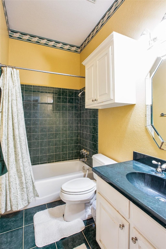 1991 Saint Andrews Dr, Red Oak, TX 75154 - bathroom featuring shower / bathtub combination with curtain, vanity, tile patterned flooring, toilet, and a textured wall