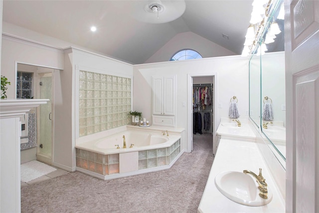 1991 Saint Andrews Dr, Red Oak, TX 75154 - full bath featuring double vanity, a bath, a shower stall, high vaulted ceiling, and a spacious closet