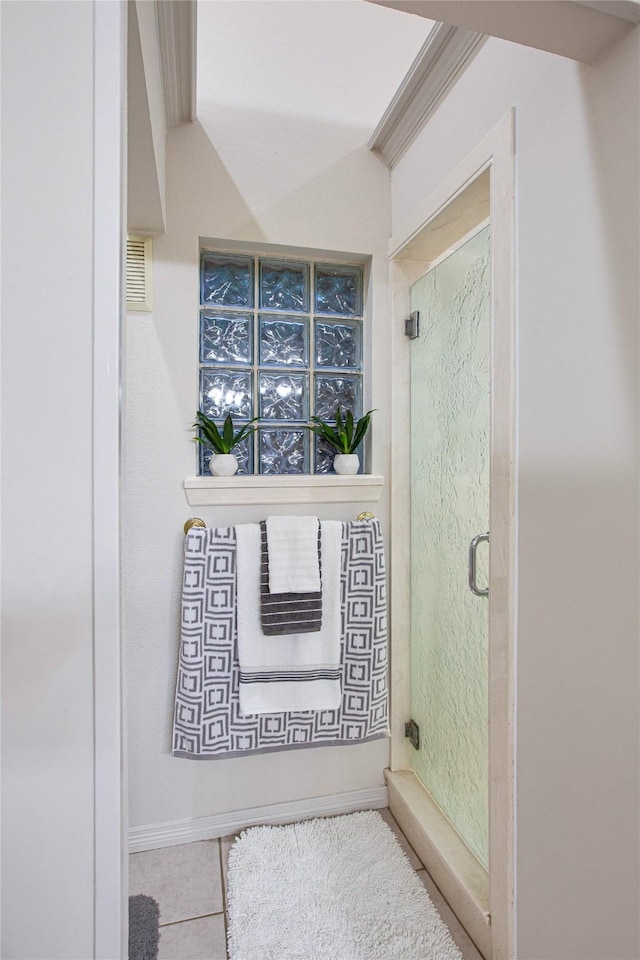 1991 Saint Andrews Dr, Red Oak, TX 75154 - full bath with tile patterned flooring, a stall shower, and baseboards