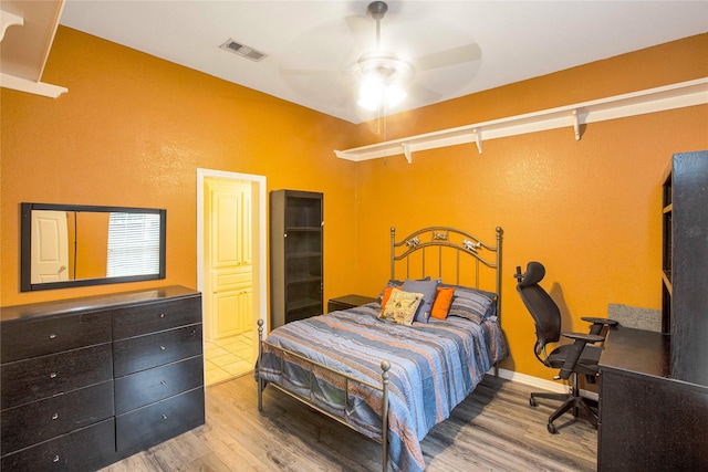1991 Saint Andrews Dr, Red Oak, TX 75154 - bedroom featuring wood finished floors and ceiling fan