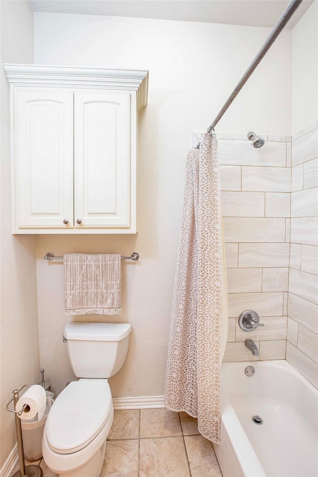 1991 Saint Andrews Dr, Red Oak, TX 75154 - bathroom with shower / bath combination with curtain, toilet, baseboards, and tile patterned flooring