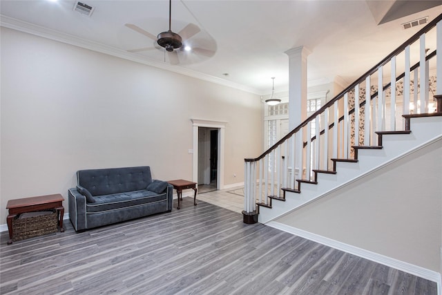 1991 Saint Andrews Dr, Red Oak, TX 75154 - entryway featuring baseboards, wood finished floors, stairway, a ceiling fan, and ornamental molding