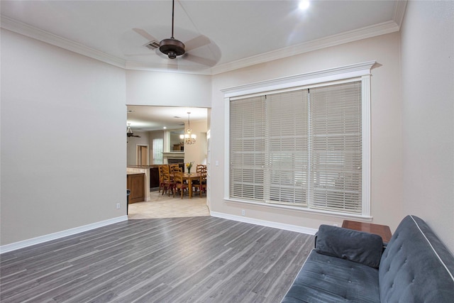 1991 Saint Andrews Dr, Red Oak, TX 75154 - living room with a ceiling fan, wood finished floors, crown molding, and baseboards