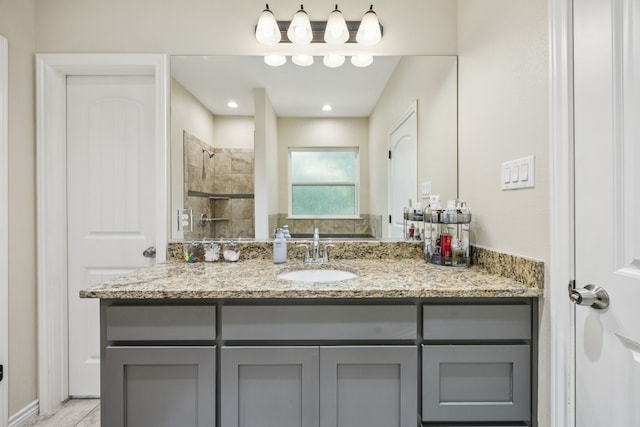 601 S 4th St, Crandall, TX 75114 - bathroom with vanity and a tile shower