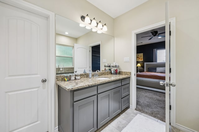 601 S 4th St, Crandall, TX 75114 - bathroom with vanity, a ceiling fan, ensuite bathroom, and tile patterned flooring