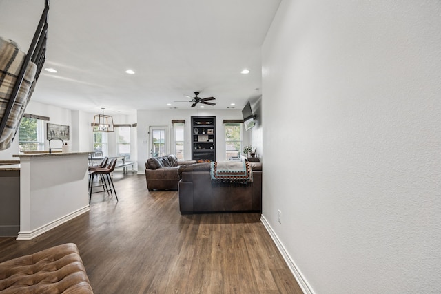 601 S 4th St, Crandall, TX 75114 - living area with dark wood-style floors, recessed lighting, baseboards, a chandelier, and a ceiling fan