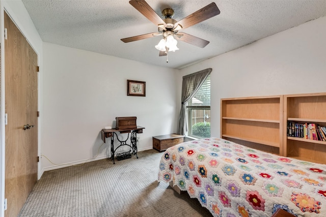 3410 Queenswood Ln, Garland, TX 75040 - bedroom with carpet floors, a textured ceiling, ceiling fan, and baseboards