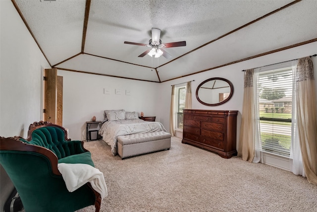 3410 Queenswood Ln, Garland, TX 75040 - bedroom featuring lofted ceiling, multiple windows, carpet floors, a textured ceiling, and a ceiling fan
