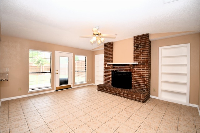 2906 Kingswood Dr, Garland, TX 75040 - unfurnished living room featuring built in features, light tile patterned floors, a fireplace, and ceiling fan