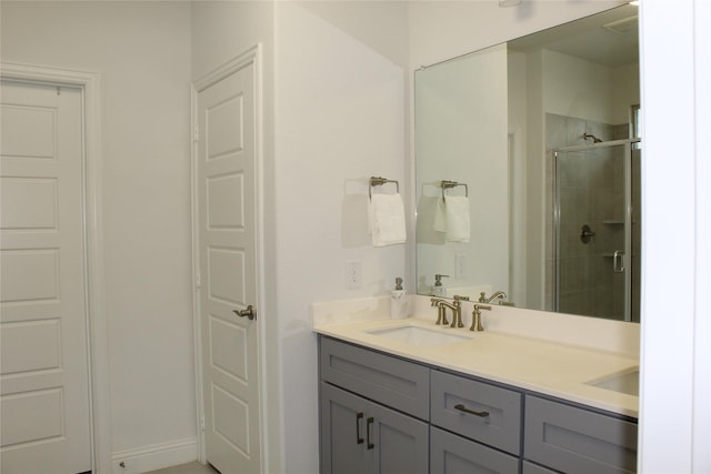 608 Remington Rd, Celina, TX 75009 - bathroom featuring double vanity and a shower stall