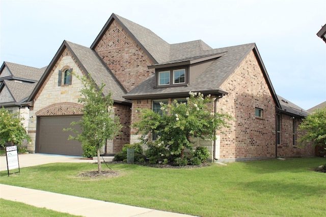 608 Remington Rd, Celina, TX 75009 - tudor-style house with driveway, a front yard, brick siding, a shingled roof, and stone siding