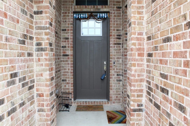 608 Remington Rd, Celina, TX 75009 - view of exterior entry featuring brick siding