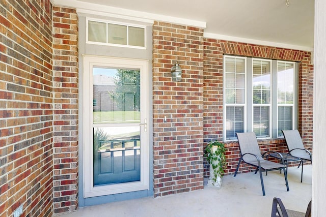 848 Ridge Point Dr, Grand Prairie, TX 75052 - property entrance featuring brick siding and a porch