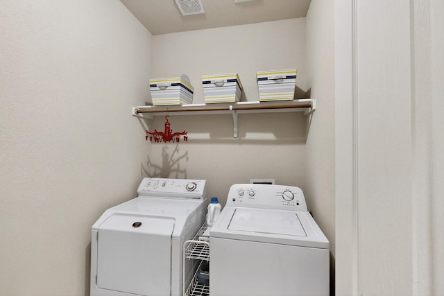 848 Ridge Point Dr, Grand Prairie, TX 75052 - laundry room featuring washer and clothes dryer