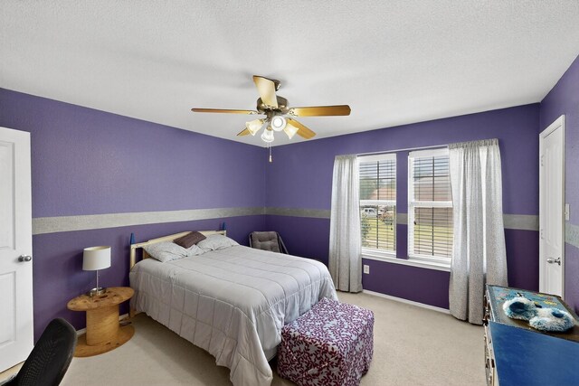 848 Ridge Point Dr, Grand Prairie, TX 75052 - carpeted bedroom featuring ceiling fan and a textured ceiling