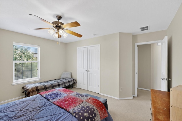 848 Ridge Point Dr, Grand Prairie, TX 75052 - bedroom featuring a closet, light colored carpet, and ceiling fan