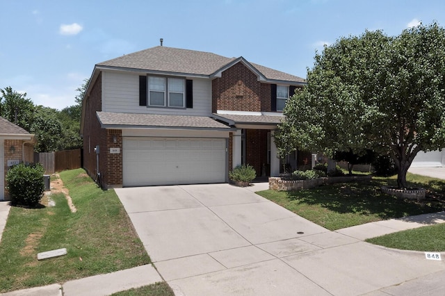 848 Ridge Point Dr, Grand Prairie, TX 75052 - view of front of house featuring brick siding, concrete driveway, and an attached garage