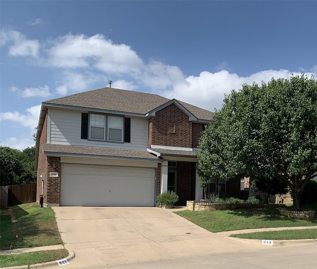 848 Ridge Point Dr, Grand Prairie, TX 75052 - traditional-style home with driveway, a garage, brick siding, and a shingled roof