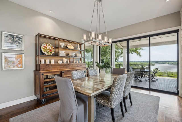 4003 Cheyenne Cir, Flower Mound, TX 75022 - dining space featuring plenty of natural light, wood-type flooring, a chandelier, and recessed lighting