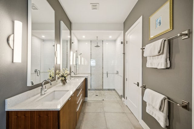4003 Cheyenne Cir, Flower Mound, TX 75022 - bathroom featuring a shower stall, double vanity, tile patterned floors, and recessed lighting