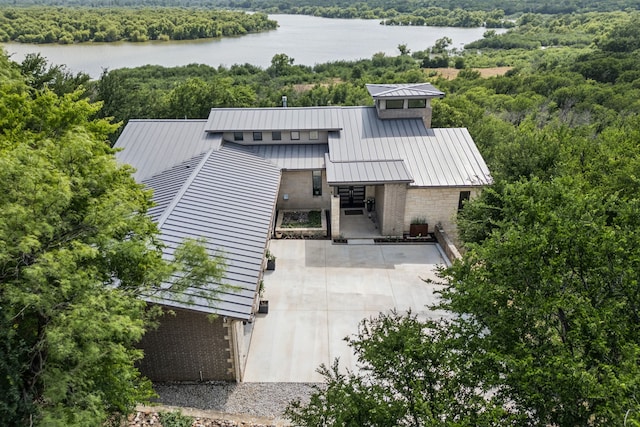 4003 Cheyenne Cir, Flower Mound, TX 75022 - view of subject property featuring a heavily wooded area and a large body of water