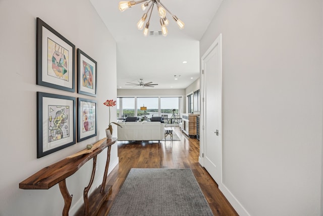 4003 Cheyenne Cir, Flower Mound, TX 75022 - hallway with a chandelier, dark wood-style flooring, baseboards, and recessed lighting