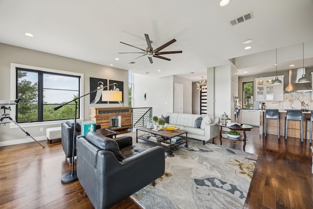 4003 Cheyenne Cir, Flower Mound, TX 75022 - living room with dark wood-type flooring, ceiling fan, recessed lighting, a chandelier, and baseboards