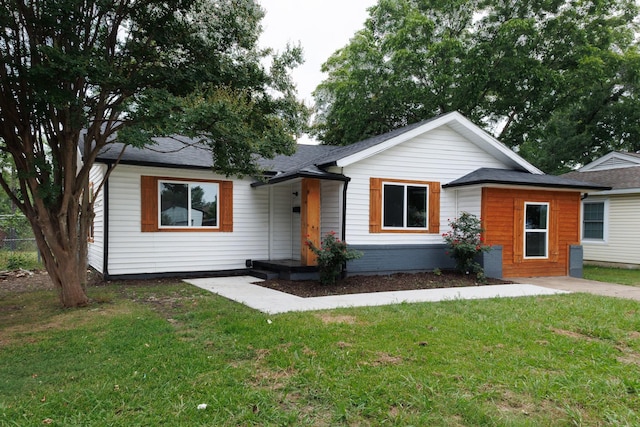 308 Chandler Dr, Garland, TX 75040 - ranch-style home featuring a front lawn and roof with shingles