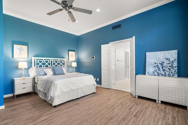1310 Rolling Acres Dr, Argyle, TX 76226 - bedroom with wood finished floors, baseboards, crown molding, recessed lighting, and a ceiling fan