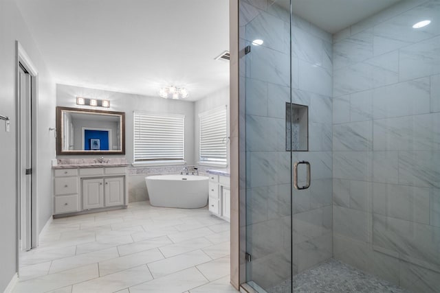 1310 Rolling Acres Dr, Argyle, TX 76226 - bathroom with vanity, a stall shower, a freestanding bath, tile walls, and a chandelier