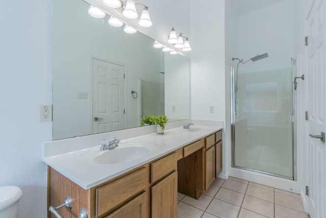 2111 Preston Trl, Forney, TX 75126 - bathroom with double vanity, tile patterned floors, a shower stall, and toilet