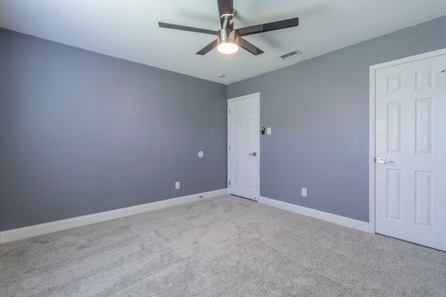 2111 Preston Trl, Forney, TX 75126 - unfurnished bedroom with light carpet, baseboards, and ceiling fan