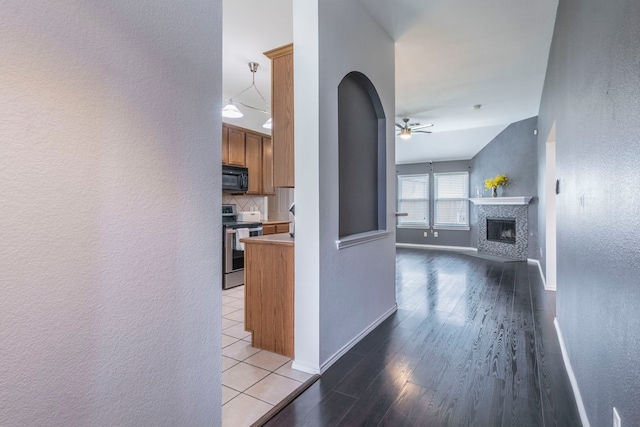 2111 Preston Trl, Forney, TX 75126 - corridor with a textured wall, wood finished floors, and baseboards