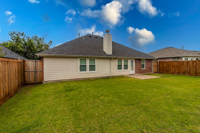 2111 Preston Trl, Forney, TX 75126 - rear view of house featuring a patio, a chimney, and roof with shingles