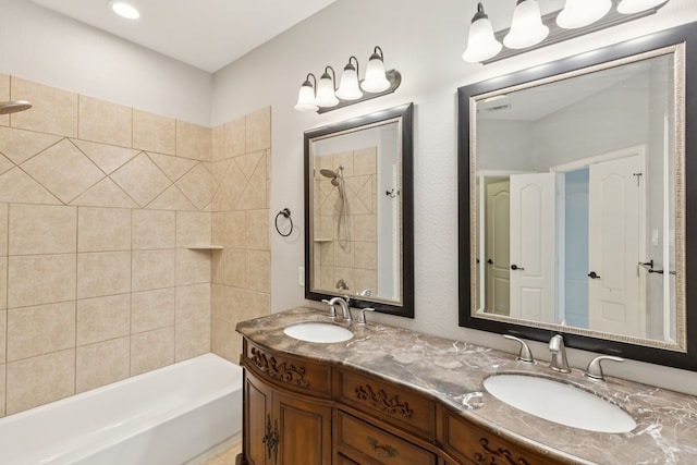 3711 Venice Dr, Irving, TX 75038 - bathroom with double vanity and bathtub / shower combination