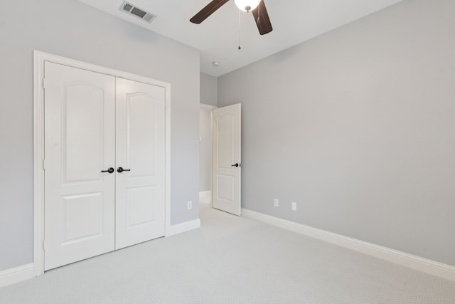 3711 Venice Dr, Irving, TX 75038 - unfurnished bedroom with light colored carpet, a closet, baseboards, and a ceiling fan