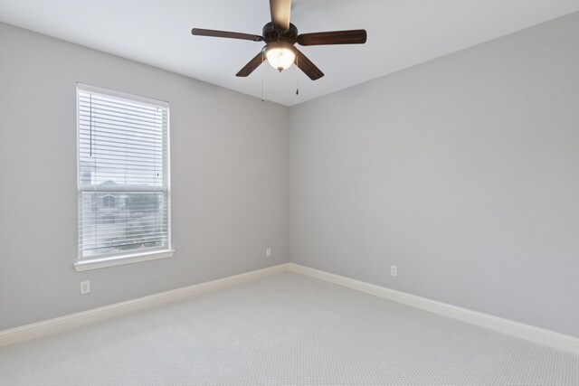 3711 Venice Dr, Irving, TX 75038 - empty room featuring carpet, ceiling fan, and baseboards